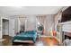 Bedroom with a fireplace and bed at 121 Hamilton St, Henderson, NC 27536