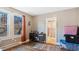 Bedroom with a glimpse of the bathroom at 121 Hamilton St, Henderson, NC 27536
