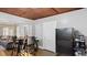 Dining area features a wood table, access to the kitchen and living room at 121 Hamilton St, Henderson, NC 27536