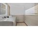 Laundry room with white washer and dryer at 121 Hamilton St, Henderson, NC 27536