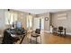 Bright and spacious living room with hardwood floors, neutral paint, and ample natural light at 121 Hamilton St, Henderson, NC 27536