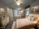 Spacious bedroom with carpet floors, neutral walls and an overhead fan at 1600 Buffaloe Rd, Garner, NC 27529