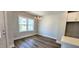 Bright dining area with a modern chandelier and ample natural light at 1905 Plott Balsam Dr, Wendell, NC 27591