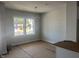 Bright dining area with a modern chandelier, large windows, and fresh, neutral paint at 1905 Plott Balsam Dr, Wendell, NC 27591