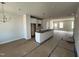 Open-concept kitchen with an island, stainless steel appliances, and easy access to the dining area at 1905 Plott Balsam Dr, Wendell, NC 27591