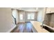 Modern kitchen island and dining area bathed in natural light at 1905 Plott Balsam Dr, Wendell, NC 27591