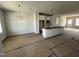 Open-concept area showcasing an island, awaiting appliances, with bright lighting, and space to create a dream kitchen at 1905 Plott Balsam Dr, Wendell, NC 27591