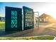 Colorful outdoor workout area with modern exercise equipment and motivational signage in Wendell Falls at 1905 Plott Balsam Dr, Wendell, NC 27591