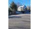 View of the home showing the yard and proximity to street at 206 S Goley St, Durham, NC 27701