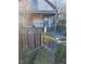 Charming two-story home with covered porch and weathered picket fence at 206 S Goley St, Durham, NC 27701