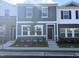 Stylish two-story home with mixed brick and siding and landscaped front yard at 2062 Glen Crossing Dr, Durham, NC 27704