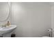 Half bathroom featuring a pedestal sink and neutral decor at 2117 Trailside Dr, Durham, NC 27704