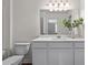Bathroom featuring a shower-tub combo and a vanity with a white countertop at 2117 Trailside Dr, Durham, NC 27704