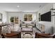 Inviting living room featuring natural light, comfortable seating, and stylish decor at 2117 Trailside Dr, Durham, NC 27704