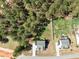 New construction home boasting a large, fenced backyard and a peaceful, wooded surroundings at 220 Green Haven Blvd, Youngsville, NC 27596