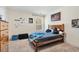 Bedroom with window, wood bed frame, and a closet at 220 Green Haven Blvd, Youngsville, NC 27596