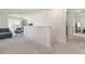 Spacious bonus room area with gray couch and foosball table at 220 Green Haven Blvd, Youngsville, NC 27596