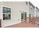 Exterior view of a cozy back deck, adjacent to sliding glass doors for easy indoor-outdoor living at 240 Amber Acorn Ave, Raleigh, NC 27603
