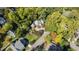 Expansive aerial view of the property showcasing the home's unique design and beautifully landscaped surroundings at 2658 Davis St, Raleigh, NC 27608