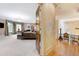 Spacious bedroom with a fireplace, comfortable seating, large windows, and access to the upper level at 2658 Davis St, Raleigh, NC 27608