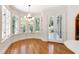 Charming breakfast nook with bay window and door, perfect for enjoying morning light at 2658 Davis St, Raleigh, NC 27608