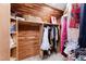 Cedar closet featuring custom storage, shelving, and hanging space at 2658 Davis St, Raleigh, NC 27608