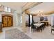 Dining room featuring a chandelier, column accents, and a full table setting at 2658 Davis St, Raleigh, NC 27608