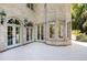 Elegant brick exterior features arched doorways and windows that flood the space with natural light at 2658 Davis St, Raleigh, NC 27608