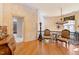 Elegant foyer with hardwood floors, ornate furnishings, decorative lighting, and detailed trim at 2658 Davis St, Raleigh, NC 27608