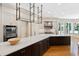 Modern kitchen featuring a large island, stainless steel appliances, and custom cabinetry at 2658 Davis St, Raleigh, NC 27608