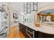 Gourmet kitchen boasts a large island, stainless steel appliances, and ample storage space at 2658 Davis St, Raleigh, NC 27608