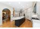 Spacious kitchen boasts a large island, stainless steel appliances, and abundant cabinet space at 2658 Davis St, Raleigh, NC 27608
