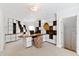 Spacious home office featuring custom shelving and a sleek, built-in desk area at 2658 Davis St, Raleigh, NC 27608