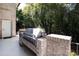 Outdoor kitchen featuring a built-in grill and brick surround, perfect for entertaining in a lush setting at 2658 Davis St, Raleigh, NC 27608