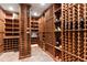 Walk-in wine cellar featuring wooden wine racks, offering ample storage for an extensive wine collection at 2658 Davis St, Raleigh, NC 27608