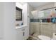 Bathroom with a glass-enclosed shower, a vanity sink, and bright, clean design elements at 2728 Old Milburnie Rd Rd, Raleigh, NC 27604