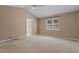 Spacious bedroom with neutral walls, carpet flooring, ample natural light, and an ensuite bathroom at 276 Sagamore Dr, Louisburg, NC 27549