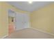 Bedroom features neutral walls and carpet at 276 Sagamore Dr, Louisburg, NC 27549