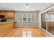 Bright dining area featuring wood floors, a window, and a sliding glass door at 276 Sagamore Dr, Louisburg, NC 27549
