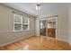 Dining room featuring wood floors, a window, and a sliding glass door at 276 Sagamore Dr, Louisburg, NC 27549