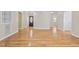 Open concept living room and entryway with hardwood floors at 276 Sagamore Dr, Louisburg, NC 27549