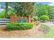 Welcoming 'Wakefield Plantation' community sign surrounded by lush landscaping, creating a sense of arrival and exclusivity at 3025 Osterley St, Raleigh, NC 27614