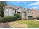 Charming brick home with a two-car garage and well-manicured landscaping at 3025 Osterley St, Raleigh, NC 27614