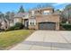 Charming brick home with a two-car garage and well-manicured landscaping at 3025 Osterley St, Raleigh, NC 27614