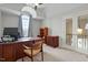 Home office featuring a desk with storage and French doors at 3025 Osterley St, Raleigh, NC 27614