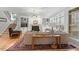 Cozy living room with built-in bookshelves and lots of natural light at 3025 Osterley St, Raleigh, NC 27614