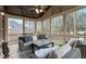 Cozy screened-in porch with comfortable seating, perfect for relaxing and enjoying the outdoors at 3025 Osterley St, Raleigh, NC 27614