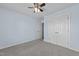 Comfortable bedroom with neutral carpet, ceiling fan and closet at 3471 Wagon Wheel Rd, Rocky Mount, NC 27804