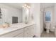 Bright bathroom with a double sink vanity, a separate toilet room, and good lighting, providing convenience and style at 349 Shadow Falls Dr, Wendell, NC 27591