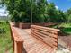 Wooden boardwalk winding through a lush green landscape with scenic views at 349 Shadow Falls Dr, Wendell, NC 27591